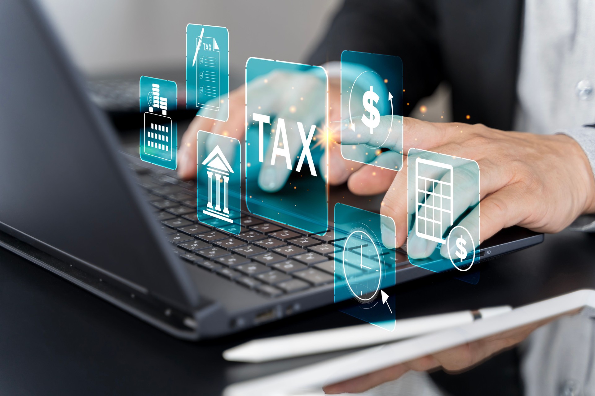 Busines using a computer to complete Individual income tax return form online for tax payment